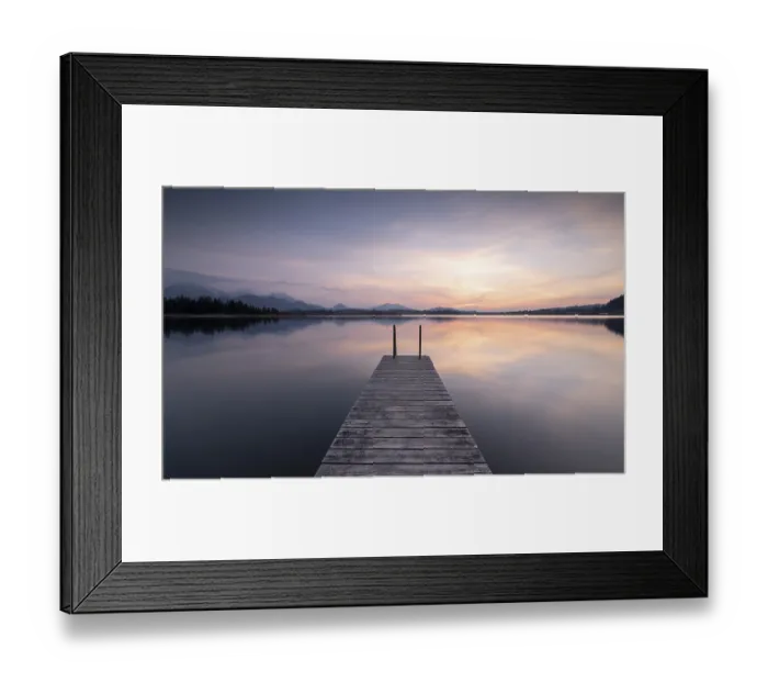 Framed Print : A footbridge stretches across a calm lake (Hopfensee) Framed Print : A footbridge stretches across a calm lake (Hopfensee)