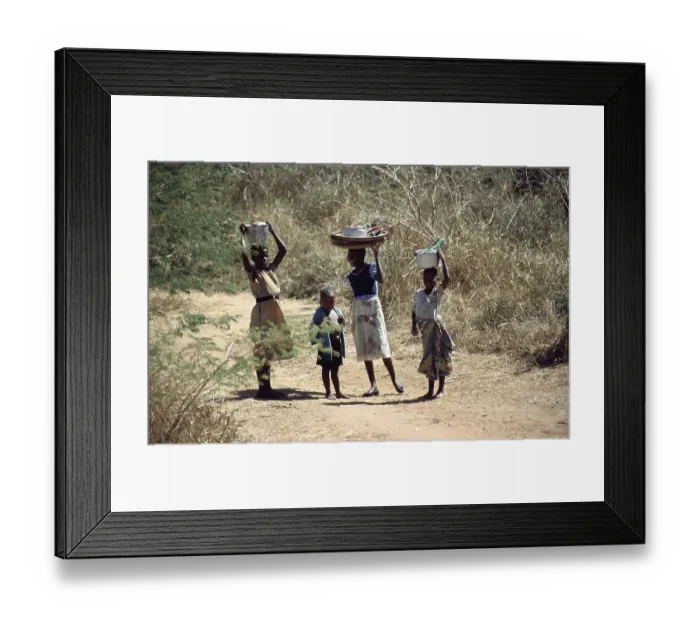 Framed Print : Girl with payloads, little boy