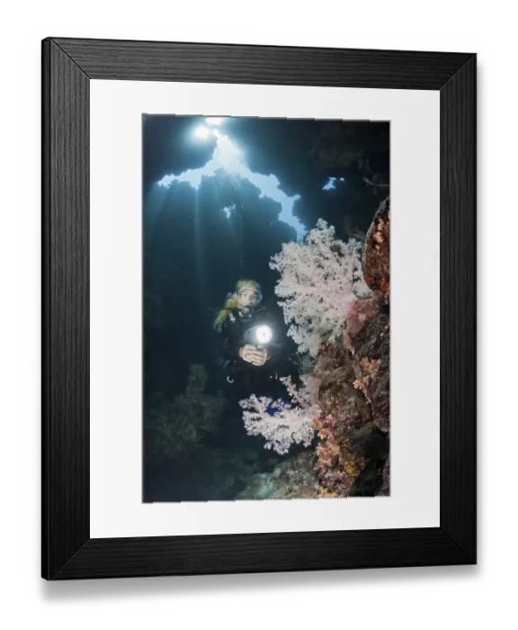 Framed Print : Diver in underwater cave, Zabargad, Red Sea, Egypt
