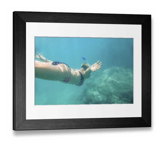 Framed Print : American flag bikini woman underwater snorkeling in the tropical sea with American flag bikini