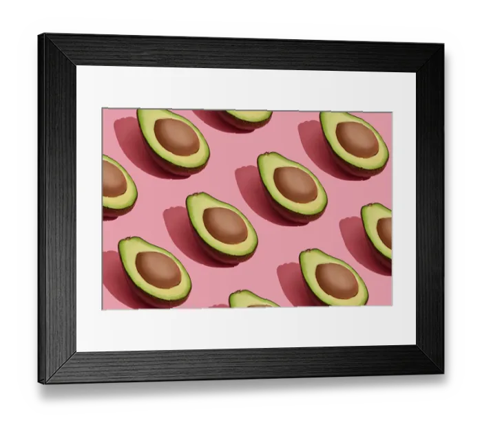 Framed Print : Food design. Top view of colorful fruit pattern of fresh cutted avocado halves with pits inside on coral pink pastel Framed Print : Food design. Top view of colorful fruit pattern of fresh cutted avocado halves with pits inside on coral pink pastel