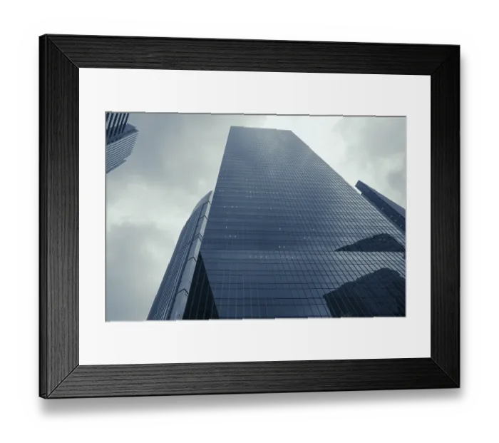 Framed Print : Modern skyscrapers and dramatic rainy sky over them