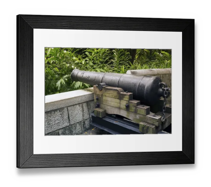 Framed Print : Historical 9-pounds cannon placed on the hill of famous Fort Canning Park in Singapore