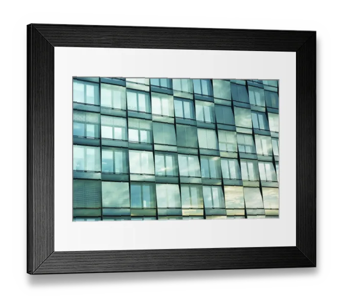 Framed Print : Window pattern of modern city with scenic sky reflection Framed Print : Window pattern of modern city with scenic sky reflection