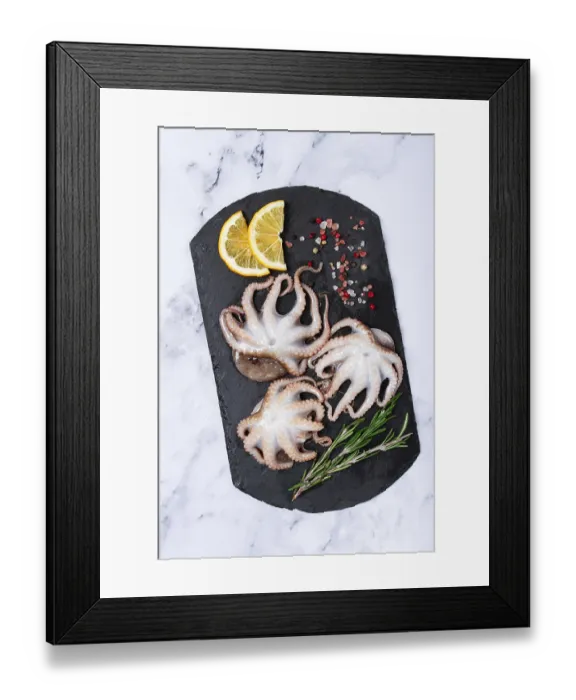 Framed Print : Fresh baby octopus, on black slate Framed Print : Fresh baby octopus, on black slate