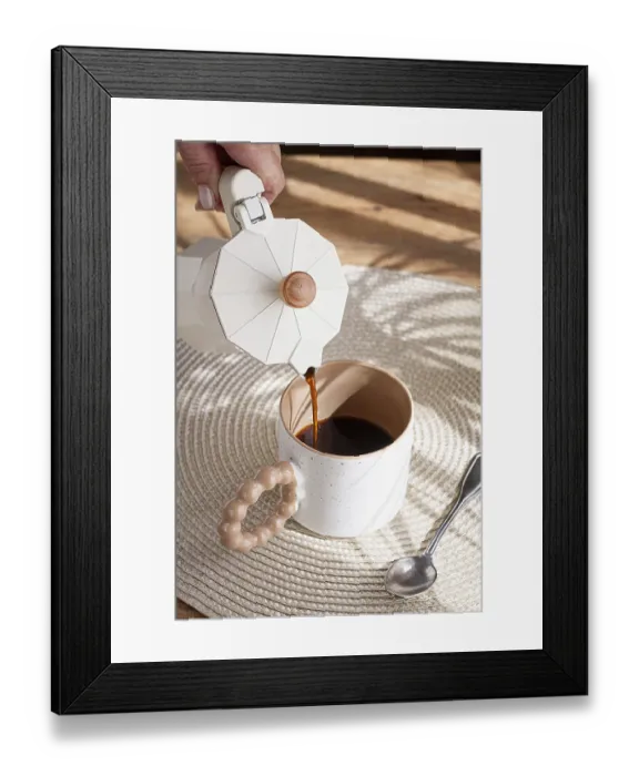 Framed Print : Pouring fresh coffee into a ceramic cup Framed Print : Pouring fresh coffee into a ceramic cup
