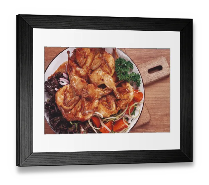 Framed Print : Baked quail, served on a plate with crispy lettuce leaves Framed Print : Baked quail, served on a plate with crispy lettuce leaves