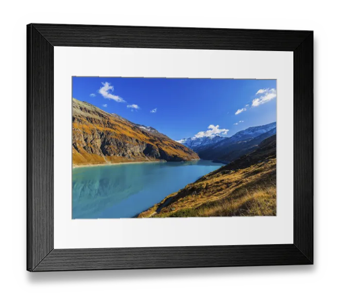 Framed Print : Lac de Moiry, in the background the peaks of the Grand Cornier