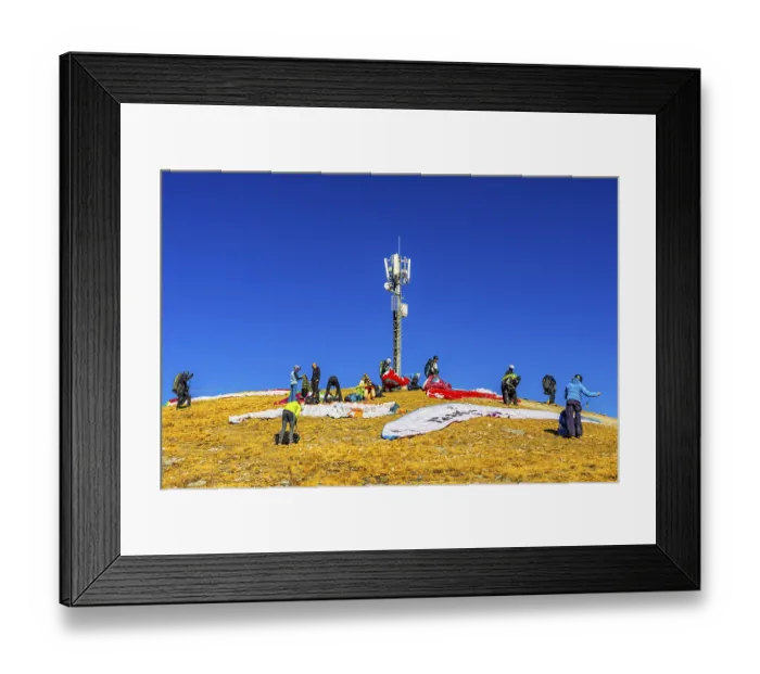 Framed Print : Paragliders prepare for takeoff below the transmitter and cell phone tower Framed Print : Paragliders prepare for takeoff below the transmitter and cell phone tower