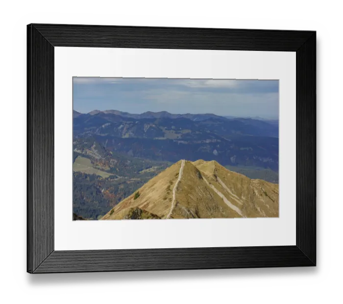 Framed Print : Hiking trail along a mountain ridge under blue sky