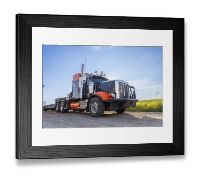 Framed Print : Powerful big rig semi truck with empty flatbed trailer parked on hemlock grove boardwalk in the canadian rockies