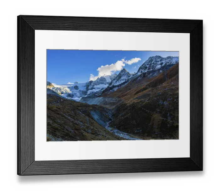 Framed Print : Clouds over the peaks of the Grand Cornier