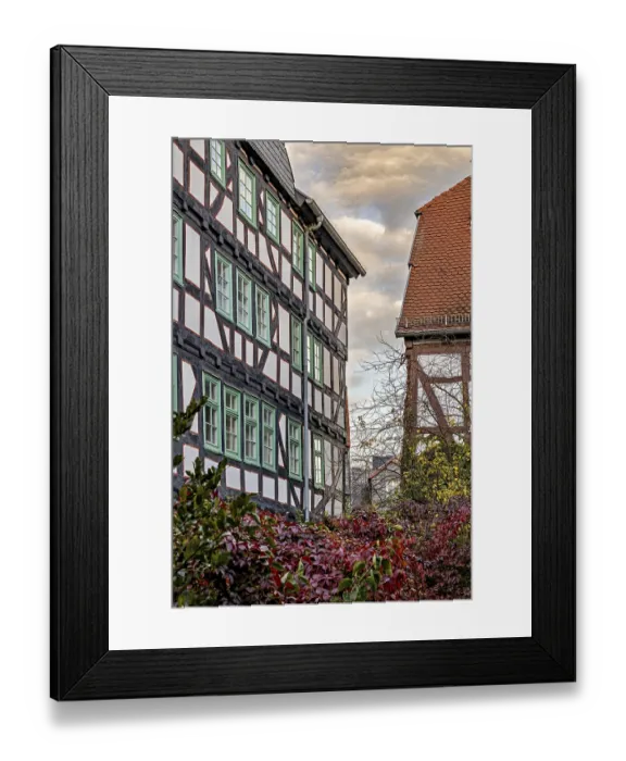 Framed Print : Historic half-timbered houses with red tiled roofs in autumn