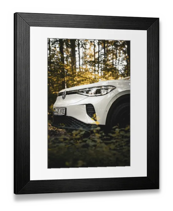 Framed Print : White car in the forest with golden sunlight through the trees