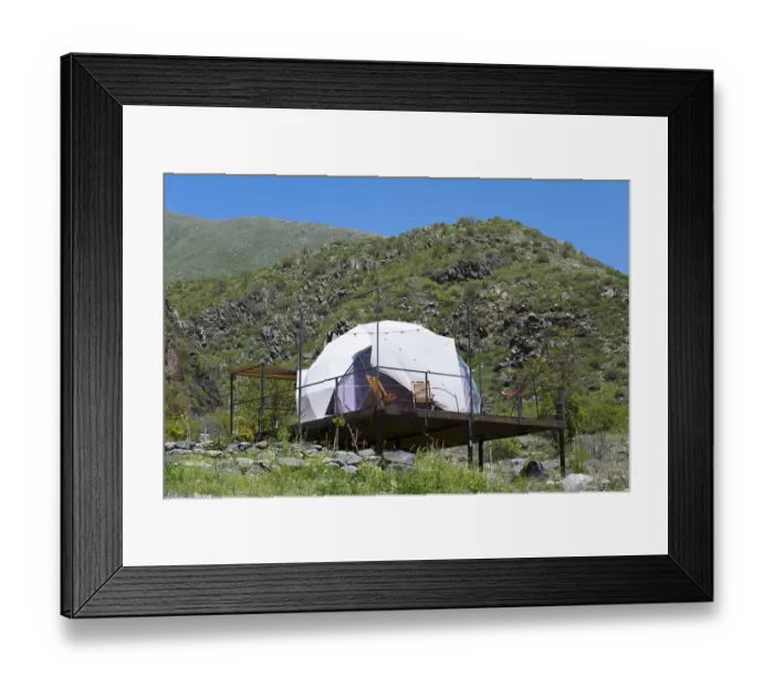 Framed Print : Dome tent on a wooden terrace in green mountain landscape under blue sky