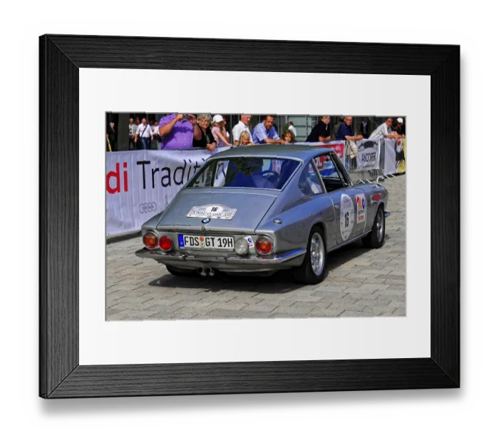 Framed Print : A silver classic car at a rally surrounded by an audience Framed Print : A silver classic car at a rally surrounded by an audience
