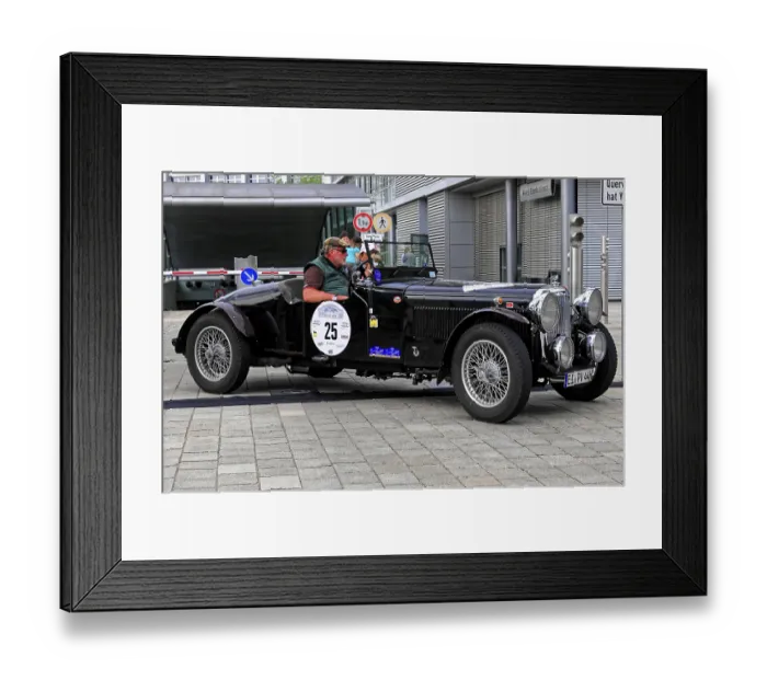 Framed Print : Alvis Crested EAGLE, black classic car with convertible roof at a rally event on cobblestones Framed Print : Alvis Crested EAGLE, black classic car with convertible roof at a rally event on cobblestones
