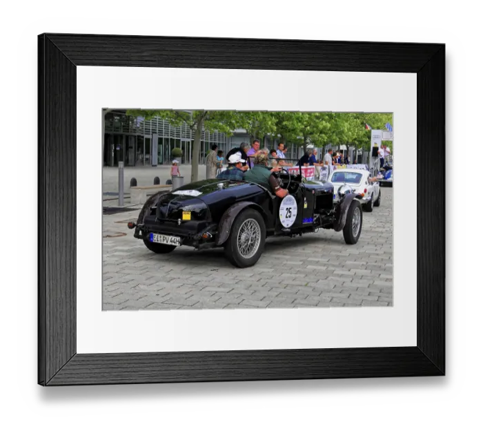 Framed Print : Alvis Crested EAGLE, black classic car with rally driver on a cobblestone road during an event Framed Print : Alvis Crested EAGLE, black classic car with rally driver on a cobblestone road during an event