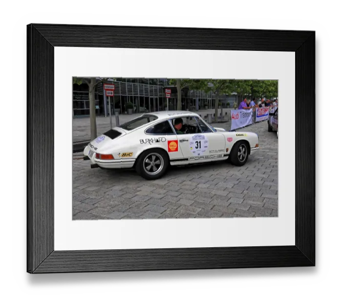 Framed Print : White Porsche with rally stickers from the side at a classic car event