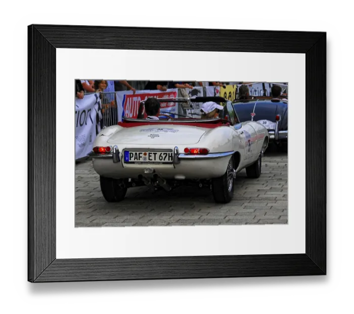 Framed Print : White convertible classic car in a series of classics seen from behind Framed Print : White convertible classic car in a series of classics seen from behind