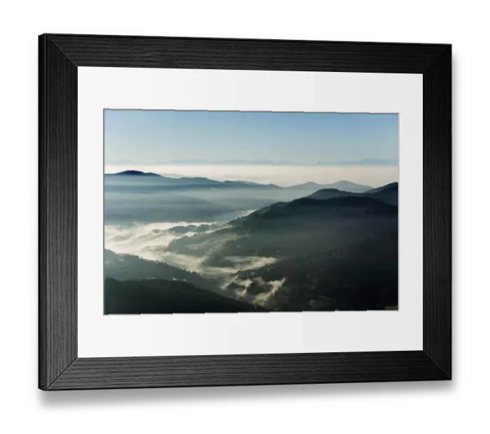 Framed Print : View from Belchen heading south of Wiesental and the Swiss Alps