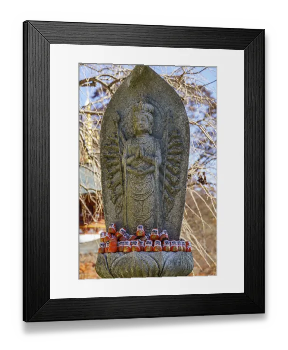 Framed Print : Buddhist statue decorated with Daruma figures