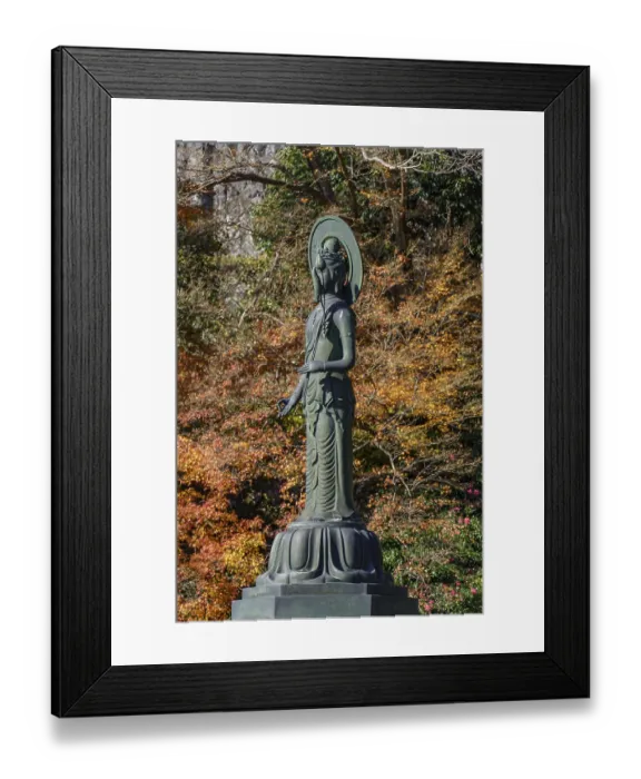 Framed Print : Buddhist statue in front of colorful autumn leaves Framed Print : Buddhist statue in front of colorful autumn leaves