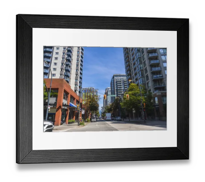 Framed Print : Modern residential and commercial buildings line a busy street in vancouver