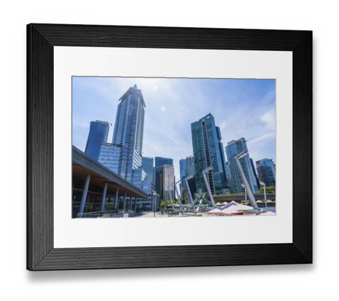 Framed Print : Glass skyscrapers and modern architecture dominate the skyline of vancouver Framed Print : Glass skyscrapers and modern architecture dominate the skyline of vancouver