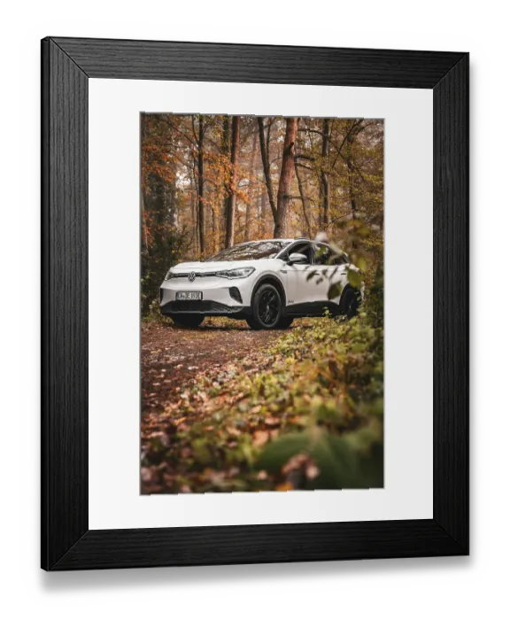 Framed Print : White car in autumn forest on a dirt road