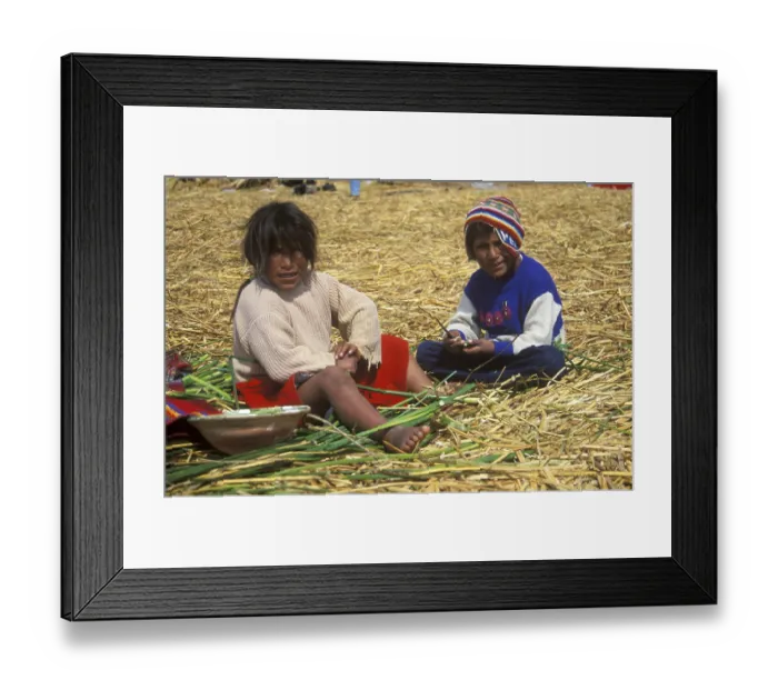 Framed Print : Children sitting on a floating Uro island in Lake Titcaca