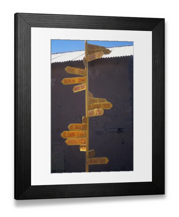 Framed Print : International guide on Isla Taquile in Lake Titicaca shows the distances to cities around the world Framed Print : International guide on Isla Taquile in Lake Titicaca shows the distances to cities around the world