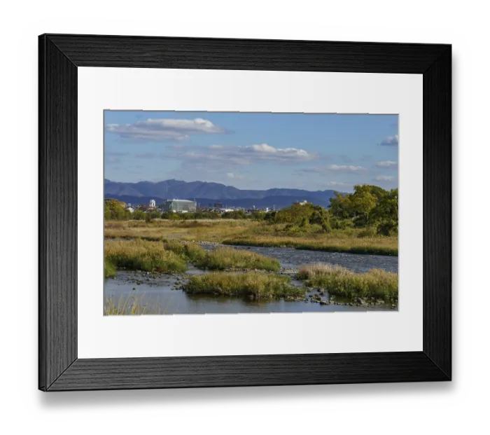 Framed Print : Wide river surrounded by greenery Framed Print : Wide river surrounded by greenery