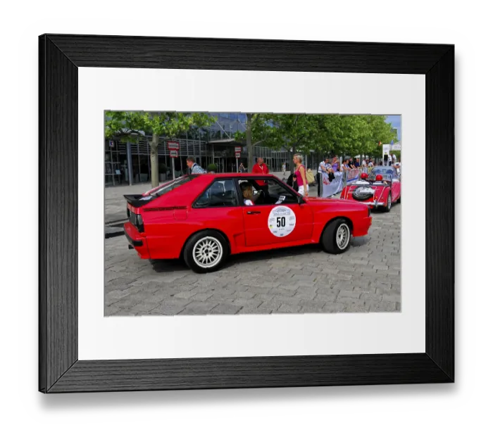 Framed Print : AUDI Sport Quattro, red Audi classic car with stickers at a rally on a city street