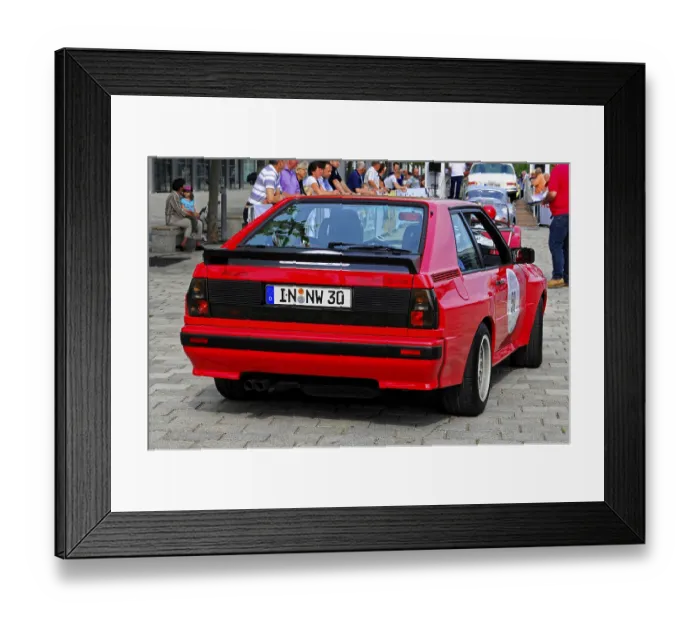 Framed Print : AUDI Sport Quattro, red Audi classic car with black spoiler on a city road Framed Print : AUDI Sport Quattro, red Audi classic car with black spoiler on a city road