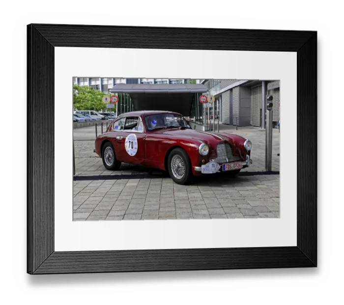 Framed Print : Austin Martin DB 2-4, Red classic car with elegant lines in an urban setting during an event