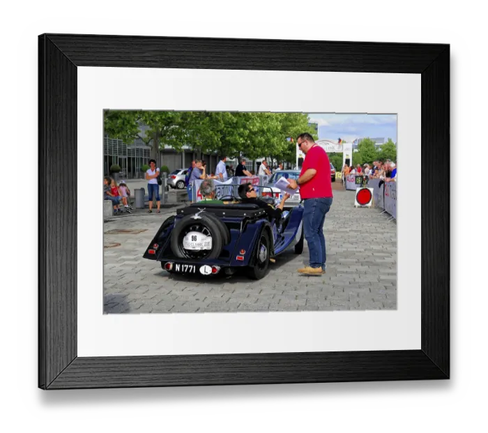 Framed Print : Morgan 4-4-2 Seater, man next to a black vintage convertible at an automotive event with spectators Framed Print : Morgan 4-4-2 Seater, man next to a black vintage convertible at an automotive event with spectators
