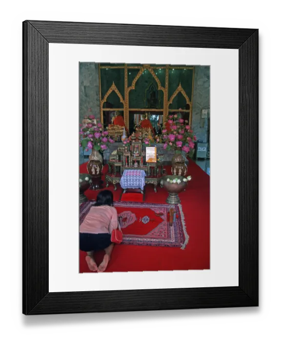 Framed Print : Believers pray at Wat Chalong monastery