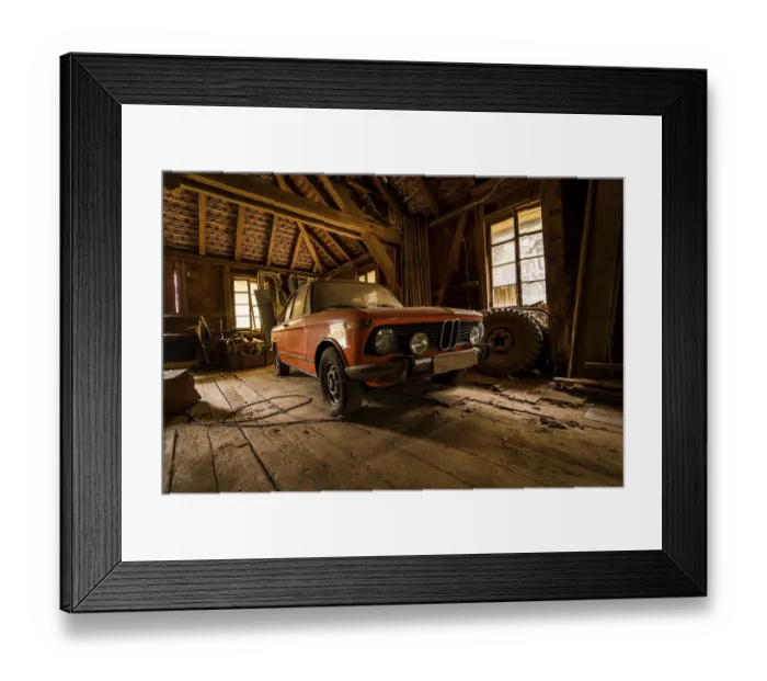 Framed Print : Sunlit Barn-Find: Dusty Orange Classic Car in Abandoned Wooden Workshop