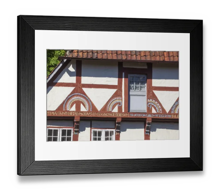 Framed Print : Decorated beams on a historic half-timbered house in Lune Abbey