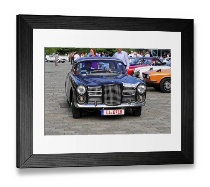 Framed Print : Elegant black coupe at a classic car show surrounded by other classic vehicles Framed Print : Elegant black coupe at a classic car show surrounded by other classic vehicles