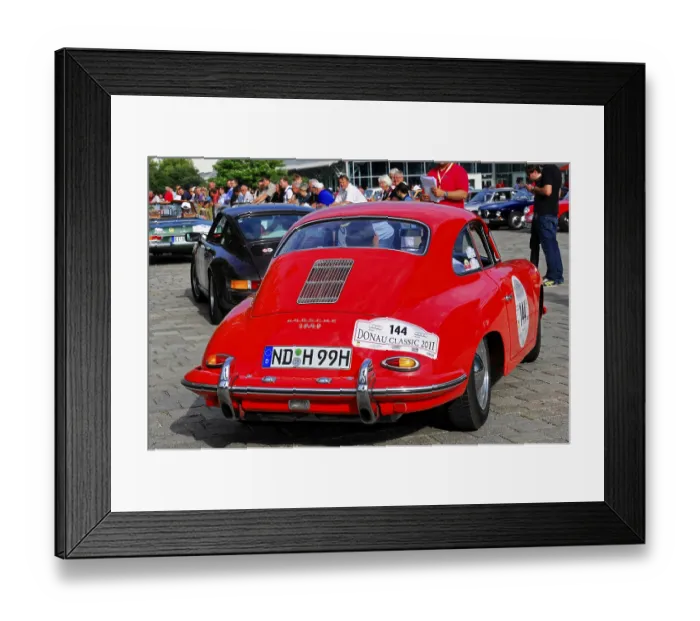 Framed Print : Red Porsche with audience in the urban setting of a classic car event