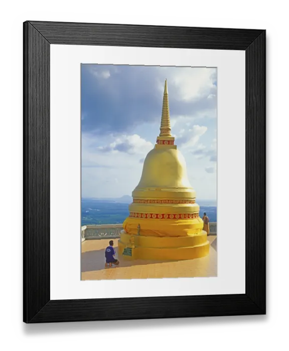 Framed Print : People, man praying, chedi in Wat Tam Sua monastery