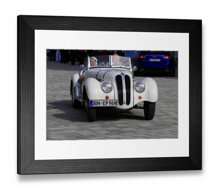 Framed Print : BMW 328 Roadster, white classic car convertible drives across a paved area