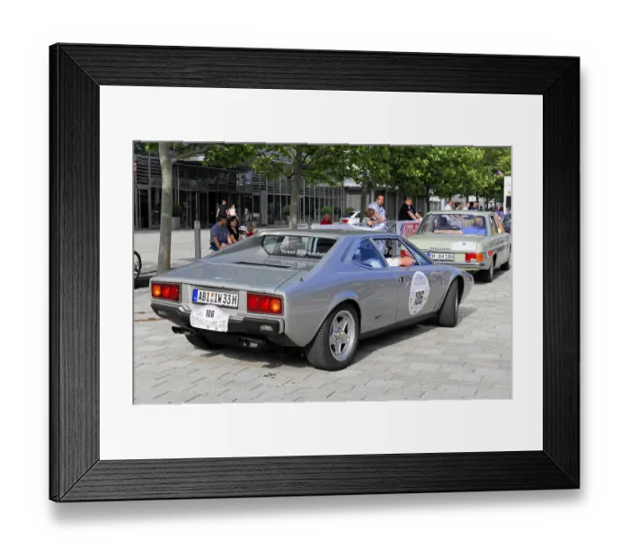 Framed Print : Rear view of a silver Ferrari classic car in an urban environment Framed Print : Rear view of a silver Ferrari classic car in an urban environment