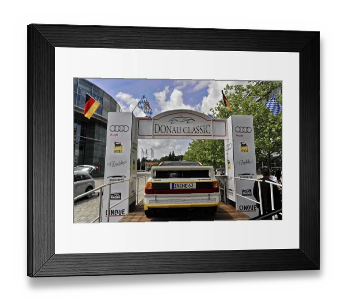 Framed Print : Classic car at the Donau Classic in front of a starting point with flags
