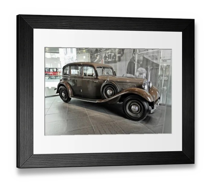 Framed Print : Brown classic car in an exhibition with historic ambiance