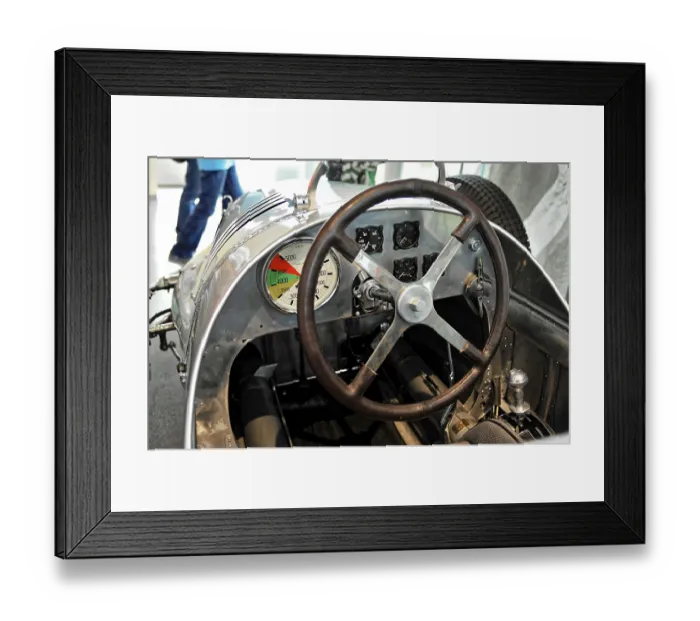 Framed Print : Cockpit view of a vintage car with steering wheel and instrument panel in retro design Framed Print : Cockpit view of a vintage car with steering wheel and instrument panel in retro design