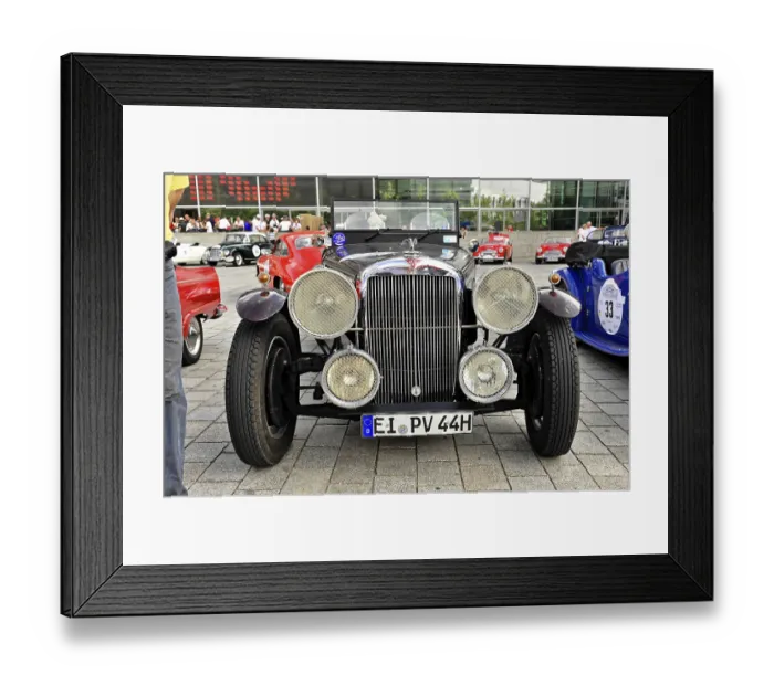 Framed Print : Front view of a vintage car with large headlights and stylish bumper Framed Print : Front view of a vintage car with large headlights and stylish bumper