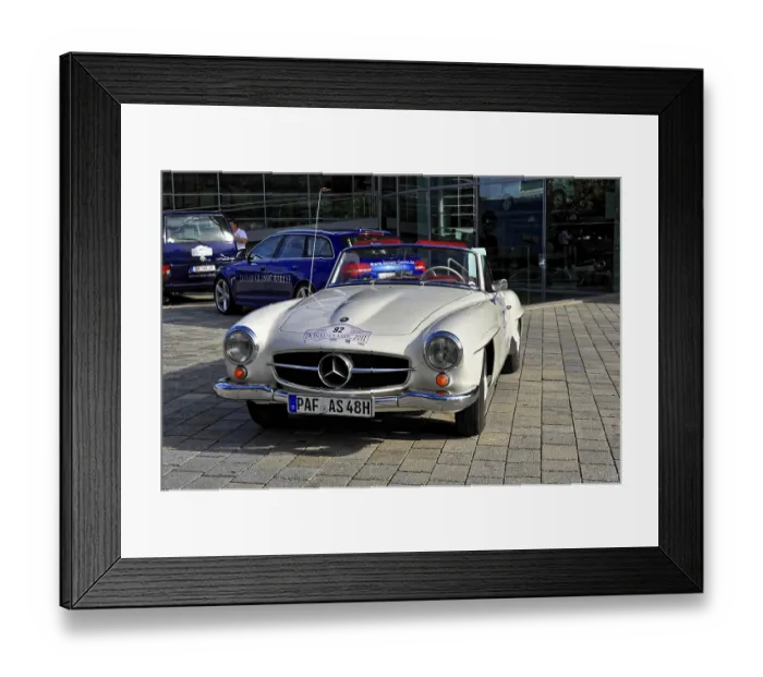 Framed Print : Silver Mercedes-Benz vintage convertible in sunlight on cobblestones